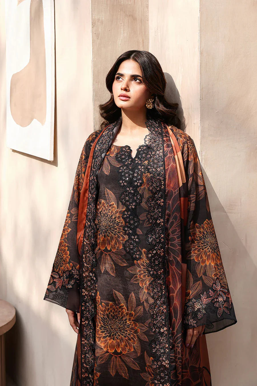Woman in black floral printed kurta with lace detailing and matching dupatta, elegant ethnic wear
