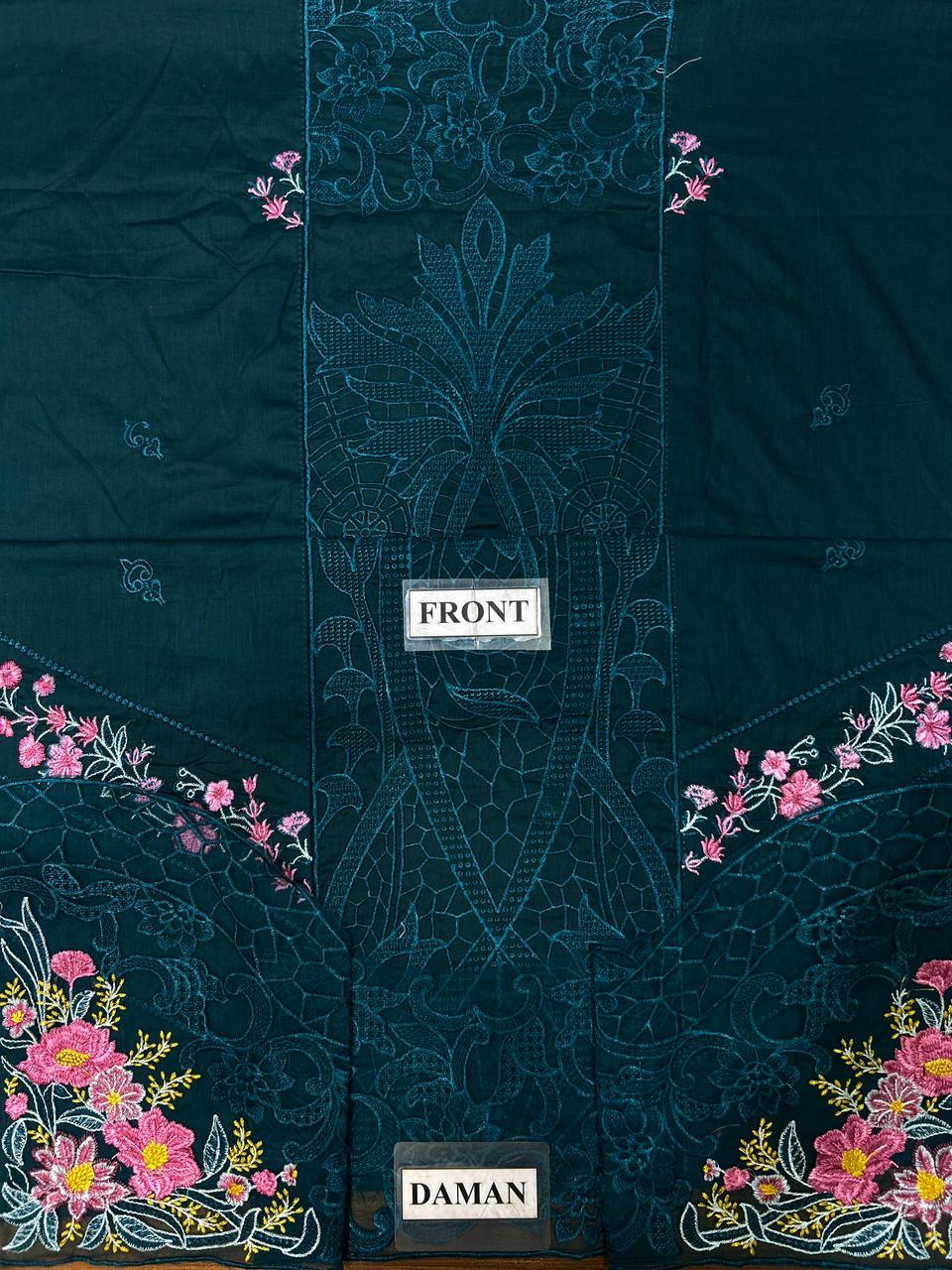 Dark teal embroidered dress with pink floral details and lace panel, labeled front and daman
