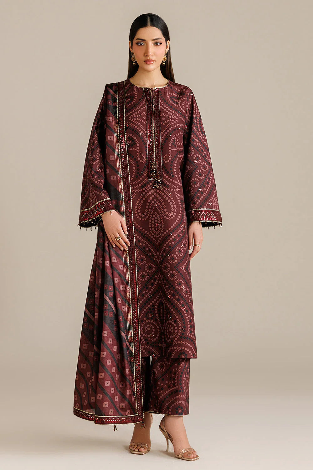 Maroon embroidered kurta with geometric print, wide sleeves, and matching palazzo pants for women