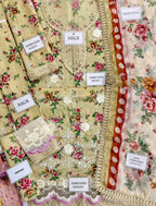 Floral embroidered lawn suit with lace neck, sleeves, front, and 4-side dupatta, labeled for details