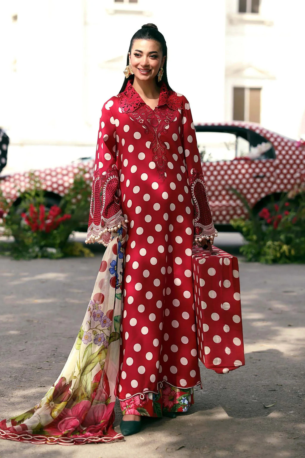 Red polka dot dress with floral dupatta and matching handbag, elegant women's fashion