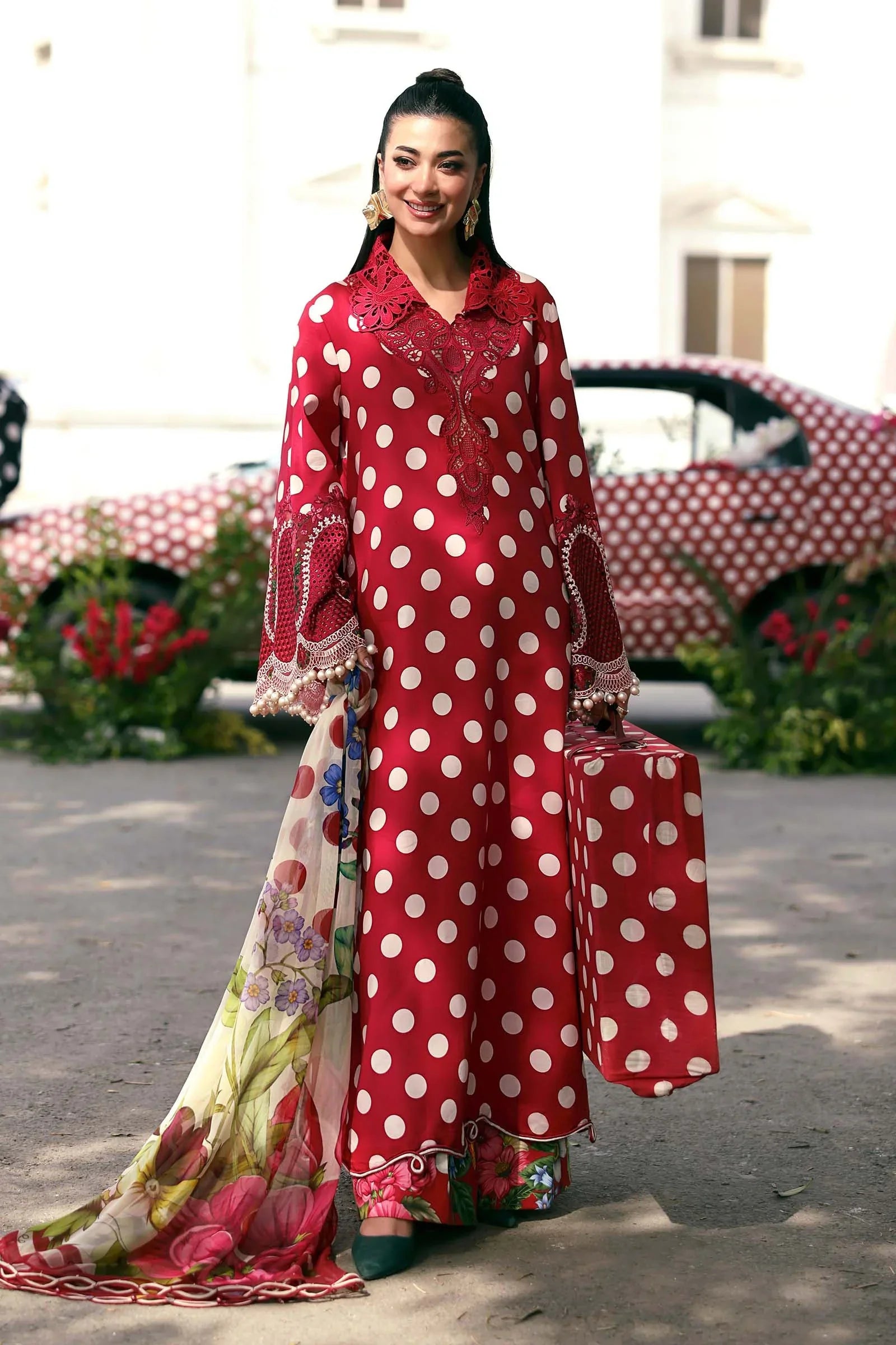 Red polka dot dress with floral dupatta and matching handbag, elegant women's fashion