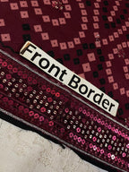 Maroon fabric with sequins and geometric pattern, labeled Front Border