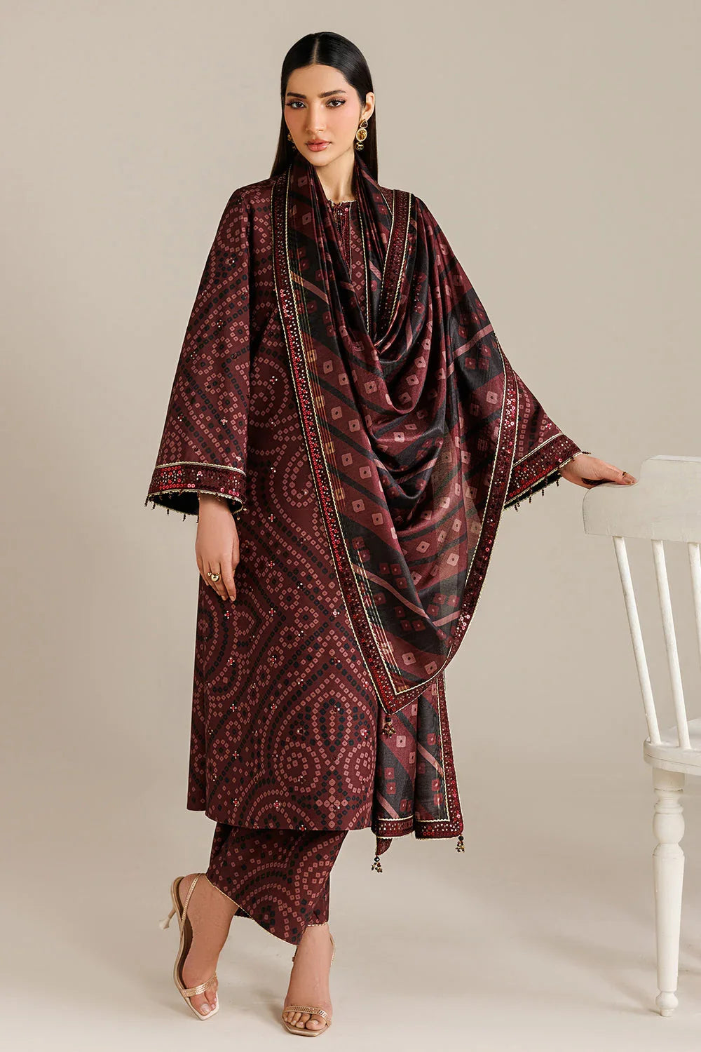 Elegant maroon printed lawn suit with embellished dupatta and palazzo pants, perfect for festive occasions